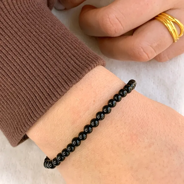 simpel svart onyks armbånd i lerretsnor - Loom Stones