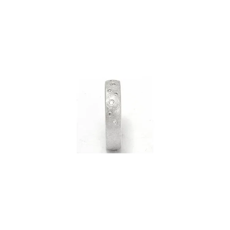 Strukturert stjernedryss giftering i 14 karat hvitt gull 0,126 ct