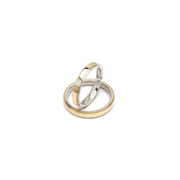 Tofarget gifteringer i 14 karat gull og hvitt gull 0,11 ct - par
