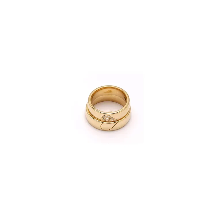 Spesiale hjerte gifteringer i 14 karat gull 0,101 ct - par