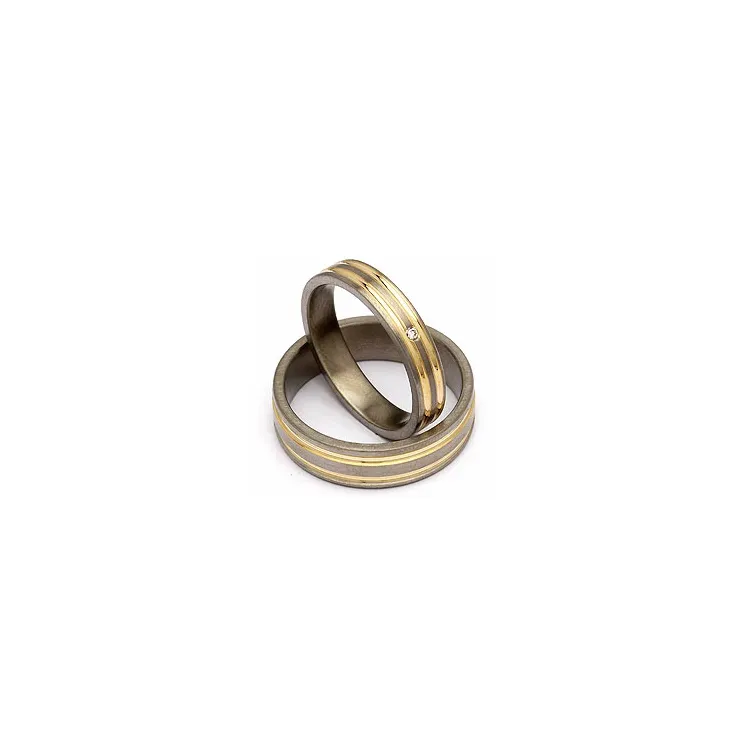Gifteringer i titanium og alm. gull 0,025 ct