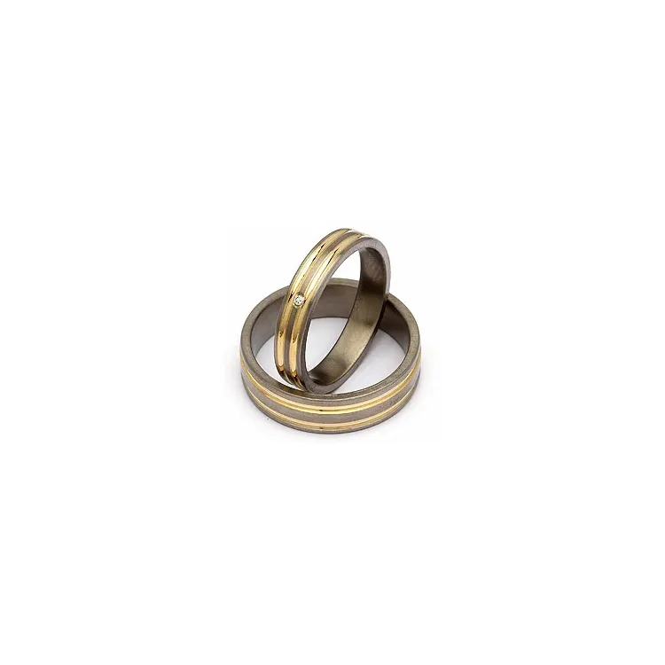 Gifteringer i titanium og alm. gull 0,025 ct
