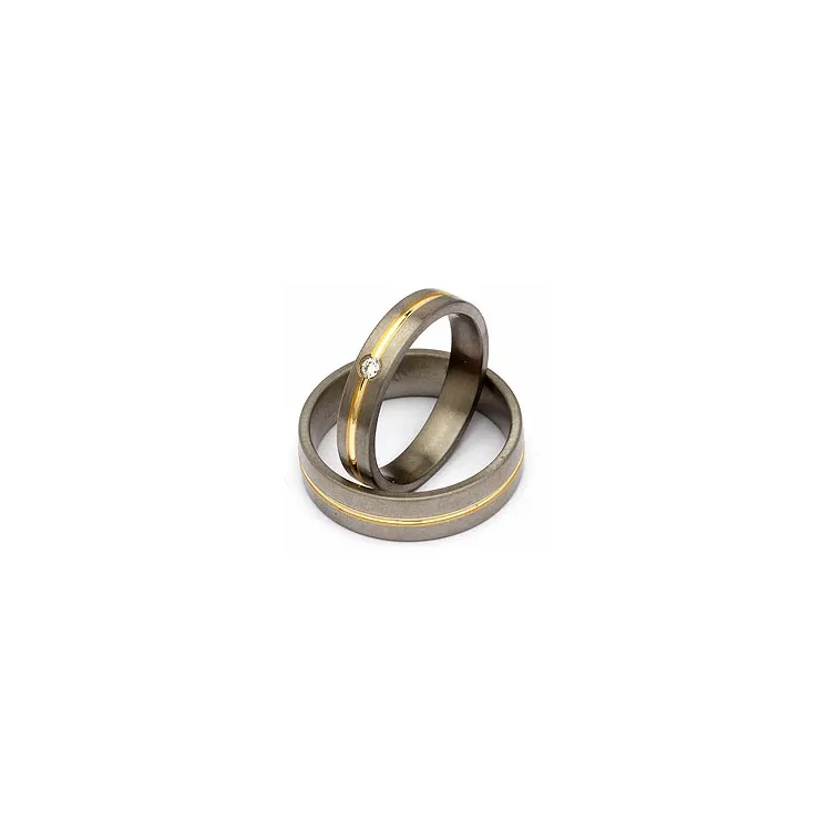 Gifteringer i titanium og alm. gull 0,04 ct