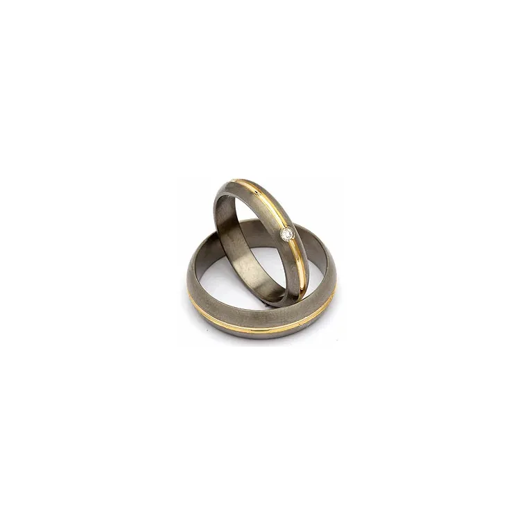 Gifteringer i titanium og alm. gull 0,03 ct