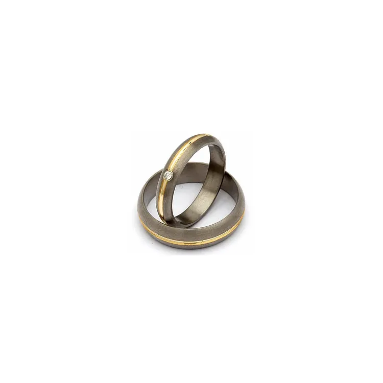 Gifteringer i titanium og alm. gull 0,03 ct