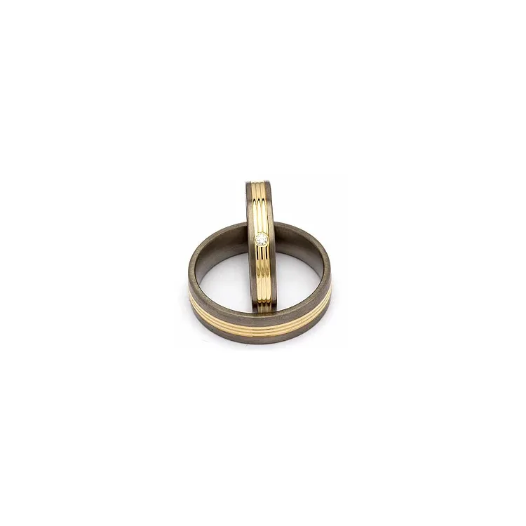 Gifteringer i titanium og alm. gull 0,025 ct