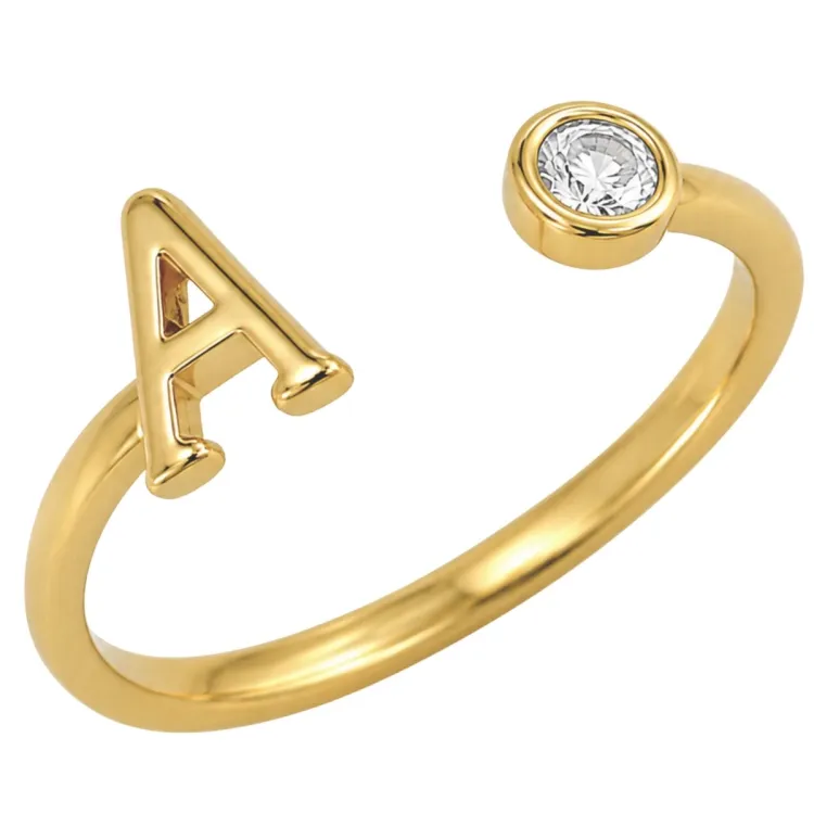 bokstav a zirkon ring i forgylt messing