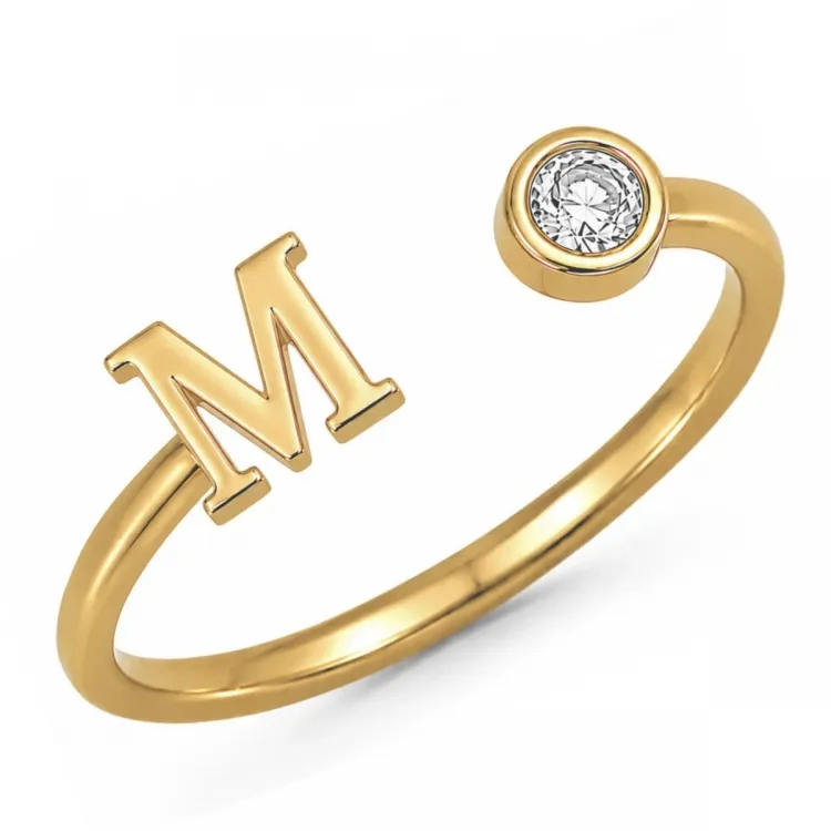 bokstav m zirkon ring i forgylt messing