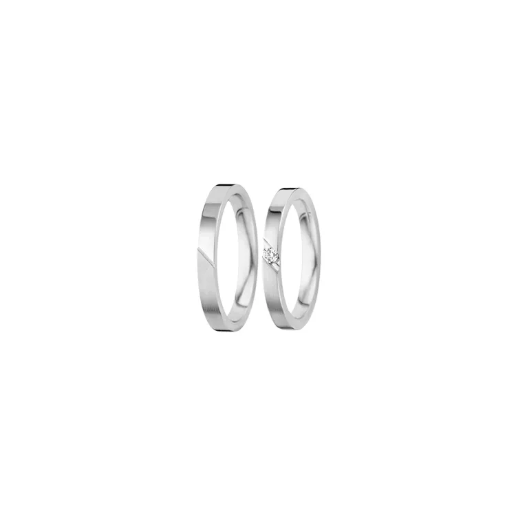 Smale gifteringer i 14 karat hvitt gull 0,050 ct - par