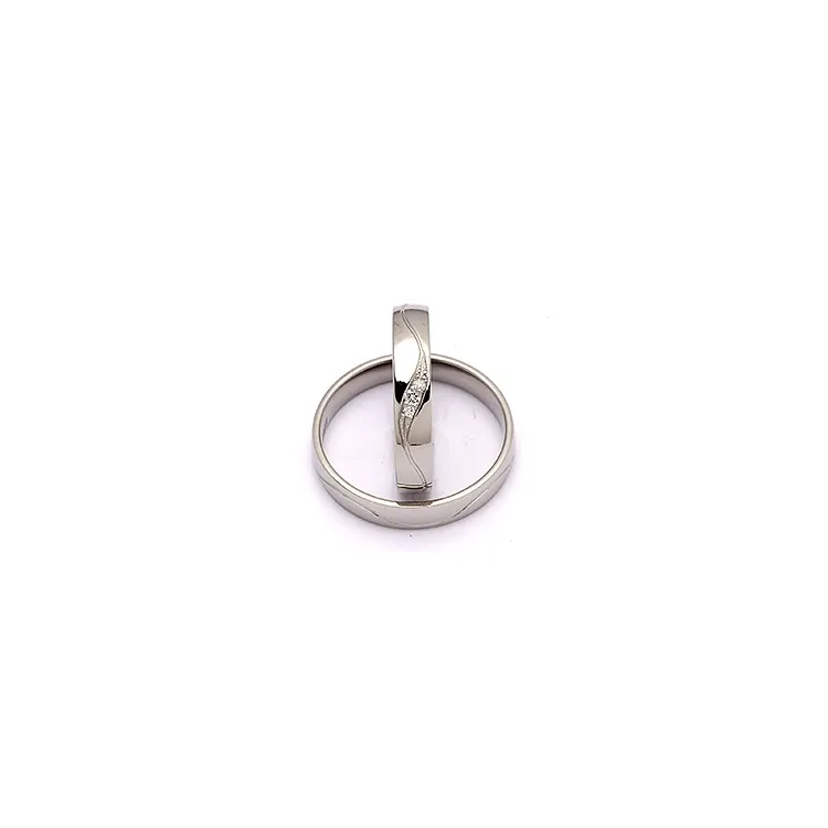 Gifteringer i palladium 0,036 ct