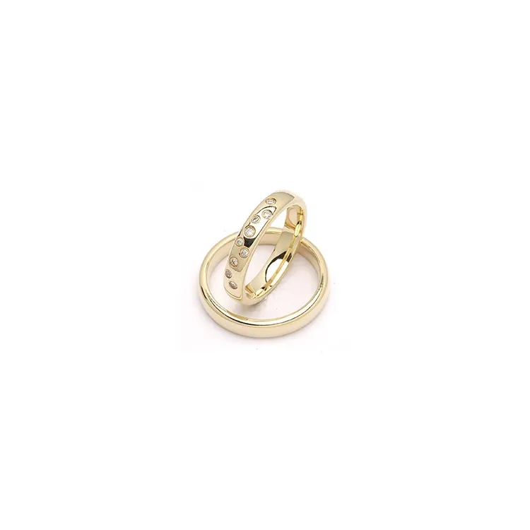 stjernedryss gifteringer i 9 karat gull 0,126 ct - par