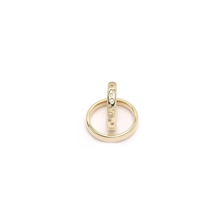 stjernedryss gifteringer i 9 karat gull 0,126 ct - par