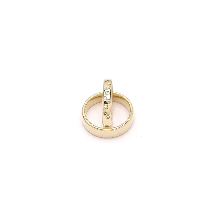 Stjernedryss gifteringer i 9 karat gull 0,126 ct - par