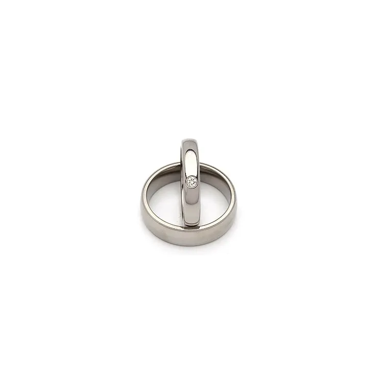 Gifteringer i titanium 0,05 ct