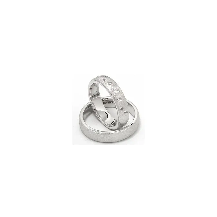 Strukturert stjernedryss gifteringer i 14 karat hvitt gull 0,126 ct - par
