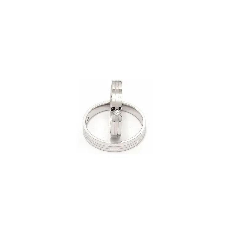 diamant gifteringer i 14 karat hvitt gull 0,018 ct - par