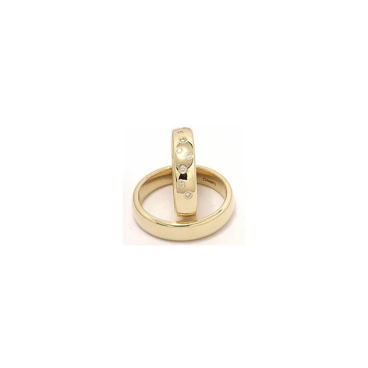 stjernedryss gifteringer i 14 karat gull 0,126 ct - par