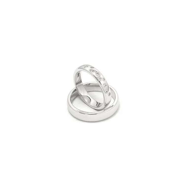 Stjernedryss gifteringer i 14 karat hvitt gull 0,126 ct - par