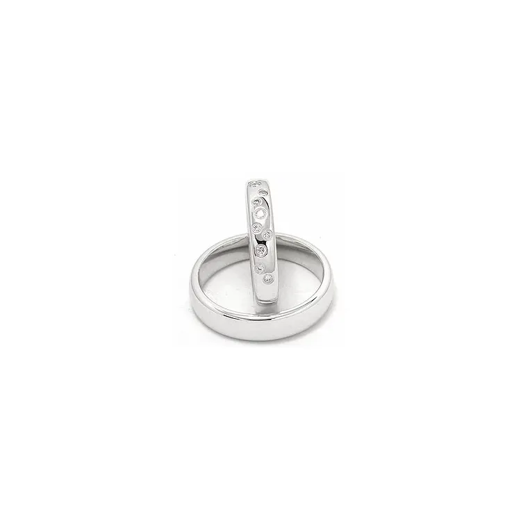 Stjernedryss gifteringer i 14 karat hvitt gull 0,126 ct - par