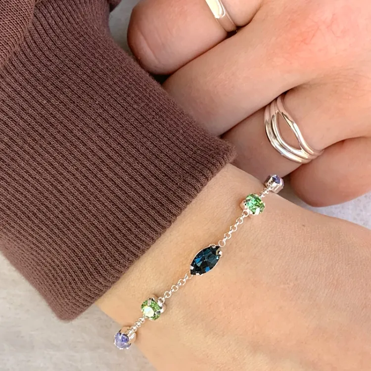 armbånd i sølv med anheng i sølv