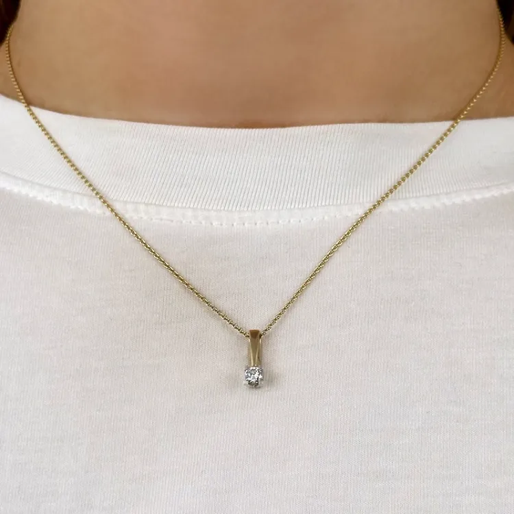 diamant solitaireanheng i 14 karat gull og hvitt gull 0,20 ct