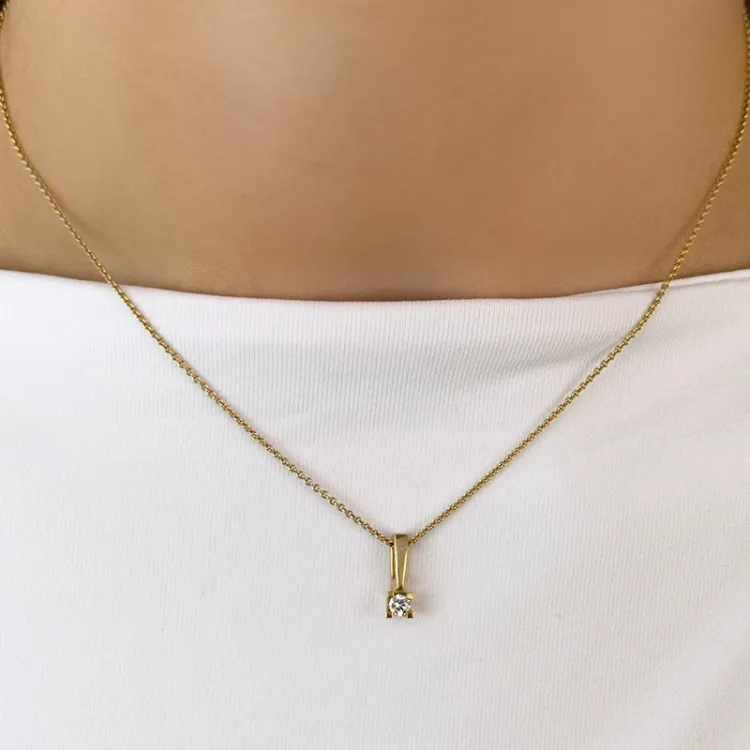 diamant solitaireanheng i 14 karat gull 0,10 ct