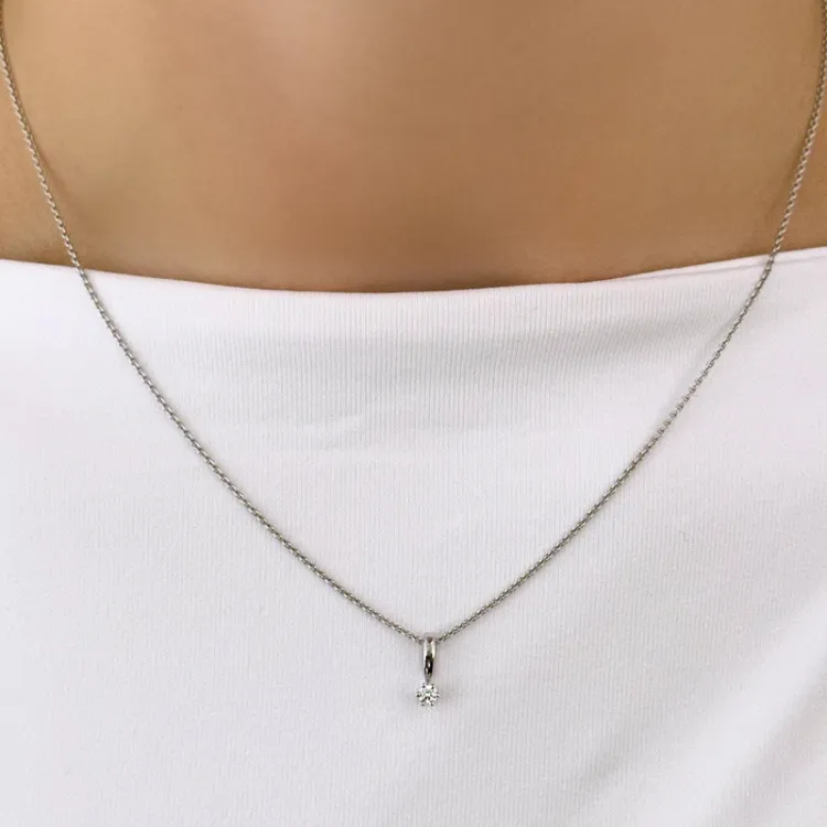 diamant solitaireanheng i 14 karat hvitt gull 0,05 ct