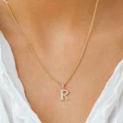bokstav r anheng i 9 karat gull