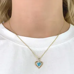 hjerte topas anheng i 9 karat gull med rhodium