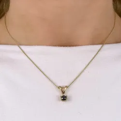 svart diamant anheng i 14 karat gull 0,50 ct