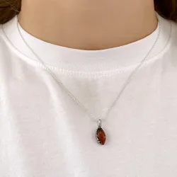 ovalt rav anheng i sølv