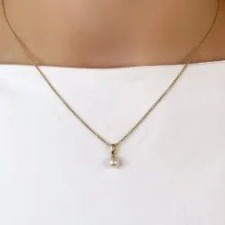 5 mm elfenben hvit perle anheng i 9 karat gull
