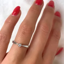 0,10 ct diamant solitairering i 14 karat hvitt gull 0,11 ct