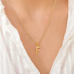 bokstav f anheng i forgylt sølv