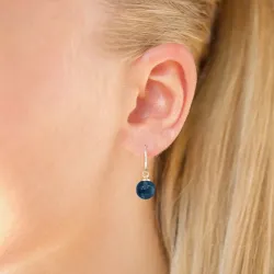 øredobber i 9 karat gull med mørkeblå krystall