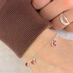 marihøne armbånd i sølv med anheng i sølv