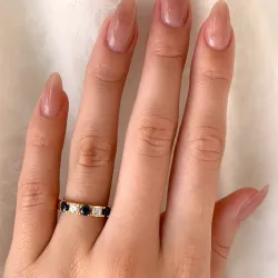 Elegant blå zirkon alliansering i forgylt sølv